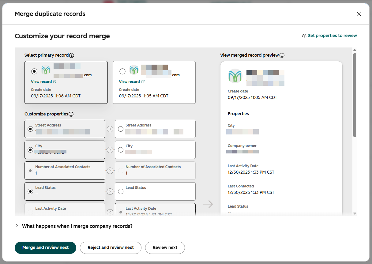 Hubspot dialog box to review company records prior to merging.